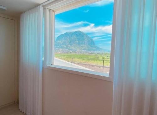 Andeok Apartment | 제주 웅장한 산방산뷰 사계2248 해무리동 감성숙소