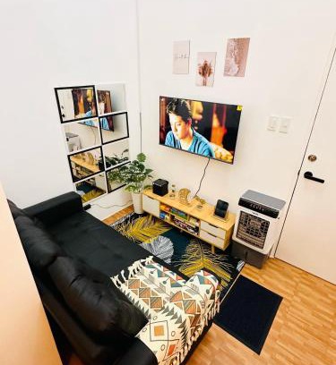 Mandaluyong Apartment | 2 Bedroom and Bathroom Staycation Condo in Mandaluyong City near BONI MRT with WIFI and KARAOKE and POOL