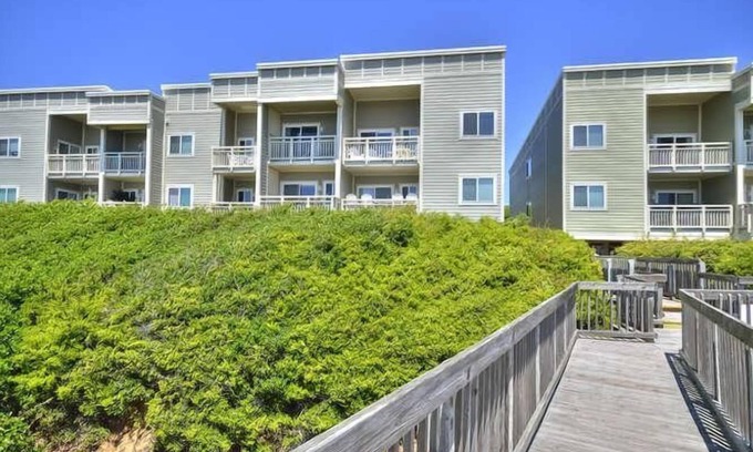 Caswell Beach Condo | 2 Story, 2 Bedroom/2Bath Oceanfront Condo with POOL-Sleeps 7