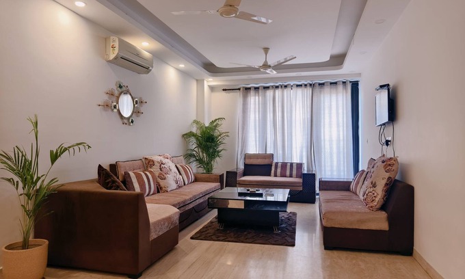 New Delhi Apartment | 3BHK Apartment,Relaxing Terrace,Greater Kailash-1, M Block Market by HostMyStay