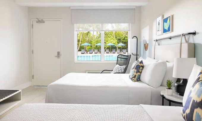 New Town Hotel | 4 Pool-view Rooms with 2 Queen Beds l Island Vibes Await in Blue Flamingo Resort