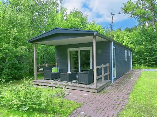 Oosterwolde Ski Chalet | 4p chalet TOLVE met 4 fietsen vlakbij natuurgebieden Drents Friese Wold, Fochteloërveen en gevangenisdorp Veenhuizen