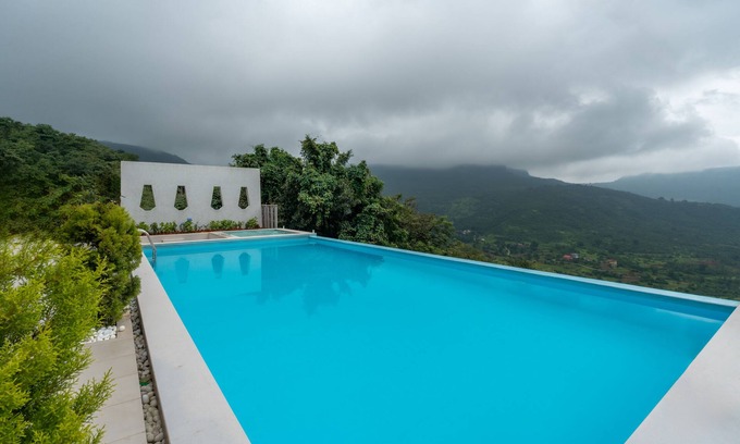 Kadadhe Villa | 5BHK Green Atlas Villa with Infinity Pool, Turf, Games and Theatre