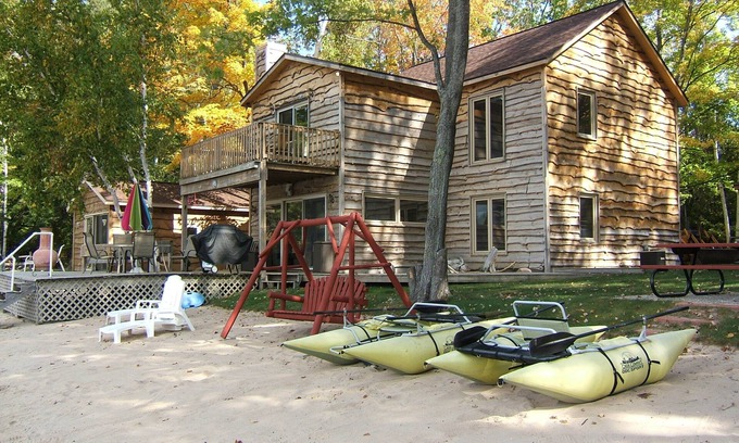 Traverse City Cottage | A Lakeside Delight w/PRIVATE Beach & Dogs Welcome