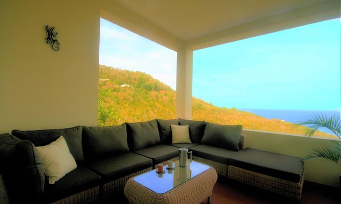 Spring Estate Villa | A modern villa with beautiful ocean views, a large private pool and gardens