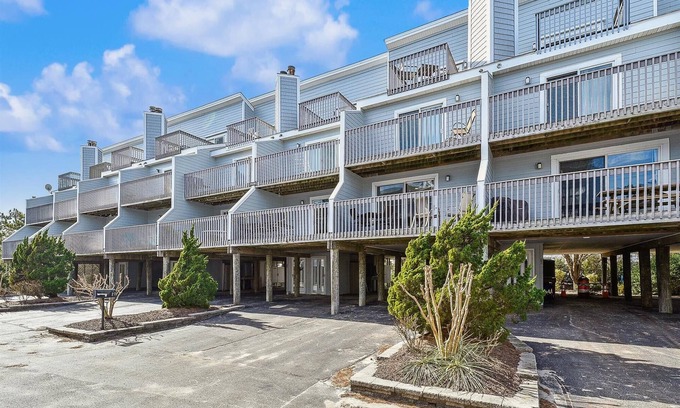 Bethany Beach House | Activities included up to $300 FREE PER WEEK! NEW LISTING 2024! Beautifully decorated vacation townhome in North Bethany approximately 300 feet from the beach and nestled behind the dunes with a private boardwalk taking you out to the surf and sand!