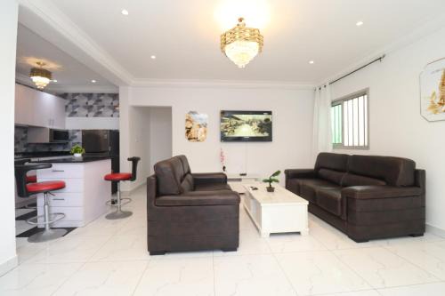 Tignere Apartment | AfriqPnB VC Appart situé à Kribi Mboamanga avec Piscine et bord de mer