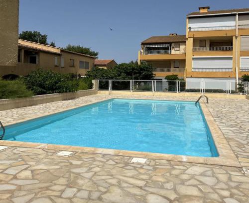 Valras-Plage Apartment | Agréable appartement avec piscine