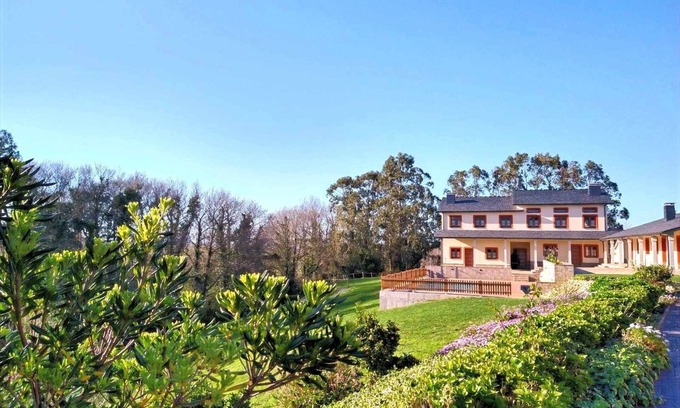 Serantes Apartment | Apartment 3: Overlooking gardens and swimming pool