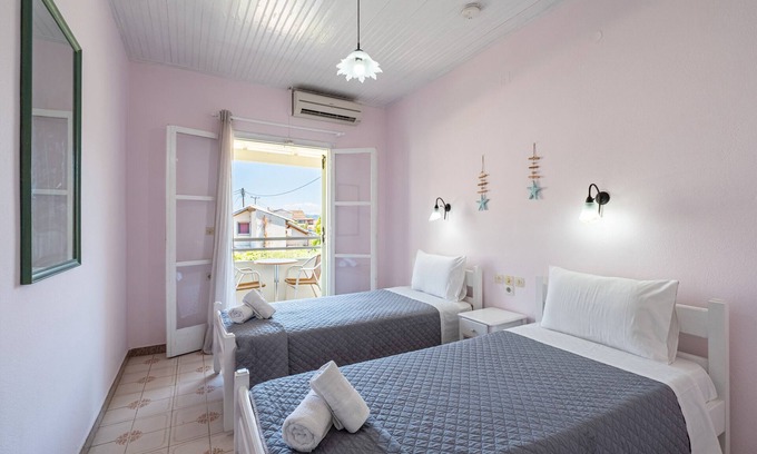 Roda Apartment | Apartment 'Alexandros Studios 8' with Shared Pool, Wi-Fi and Air Conditioning