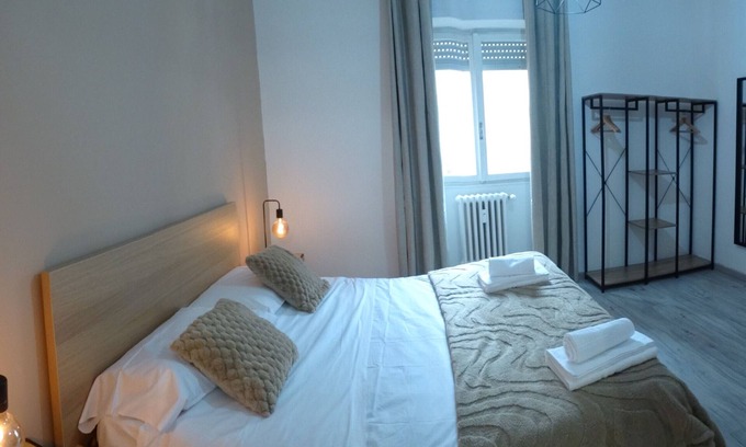 Quartiere XXIV Don Bosco Apartment | Apartment 'Cominio 56 - Near Metro A' with Balcony and Air Conditioning