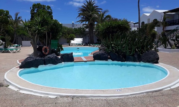 Los Pocillos Condo | Apartment in a residence