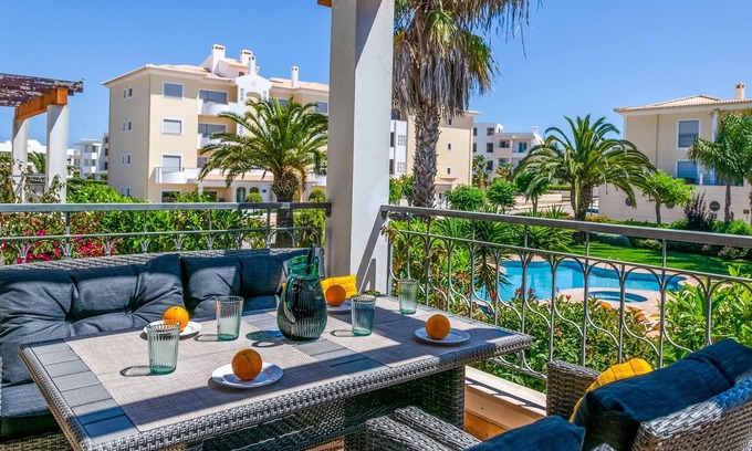 Porto de Mos Apartment | Apt. Casa Palmeira, with communal pool and close to the beach