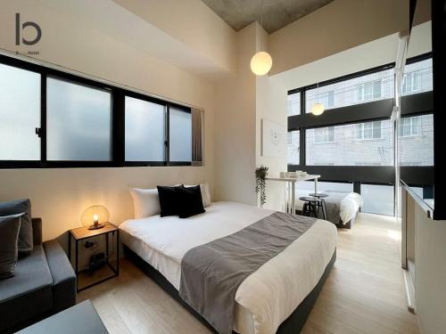 Hiroshima City Centre Apartment | b hotel Nekoyard - Stylish Loft Studio Steps from Peace Park