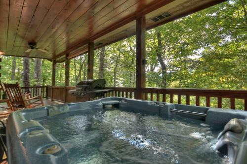 Blue Ridge Villa | Bearfoot Ridge Wood-burning fireplace cozy hot tub serene views