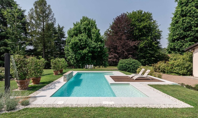 Beregazzo Con Figliaro Villa | Beautiful villa with pool surrounded by nature near Golf and Tennis courts