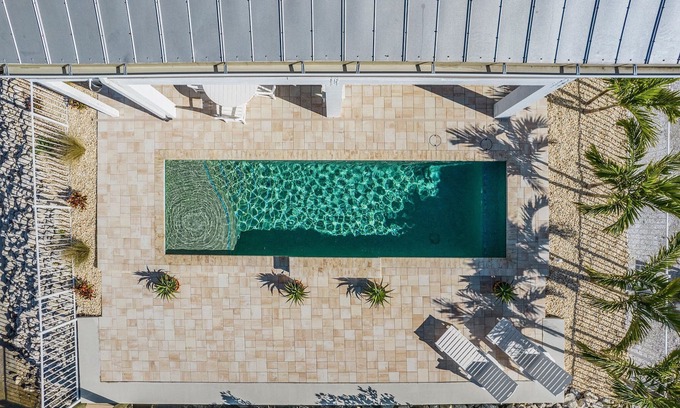 Pine Island Center House | Beautiful 3/3 Island Retreat with Heated Pool, Dock & Private Boat Ramp.