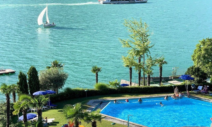 Bissone Apartment | Beautiful apartment for 4 guests with pool, A/C, WIFI, TV, balcony and panoramic view