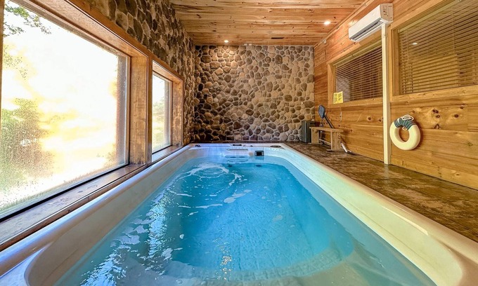 Chalet Village Cabin | Beautiful Cabin w/ Indoor Heated Pool & Hot Tub