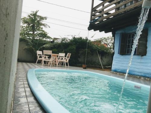 Vila Nova House | Biocasa com piscina a 1 quadra e meia da Praia