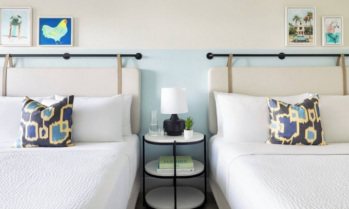 New Town Hotel | Blue Flamingo Resort l 4 Rooms, Pool, Cabanas, Karaoke & Old Town Shuttle