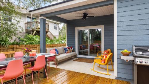 Vilano Beach House | Blue Hour Playfully Designed Beach Home w Hot Tub Fire Pit Game Room