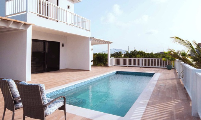 Leeward Settlement Apartment | Breezy Escape with Shared Pool & Easy Beach Access