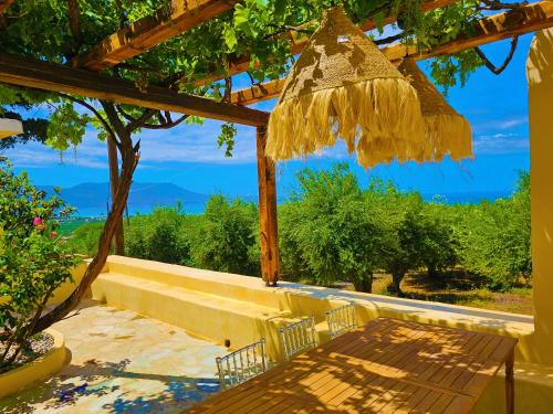 Drapanias House | BROWN ON GREEN a stone house with amazing view