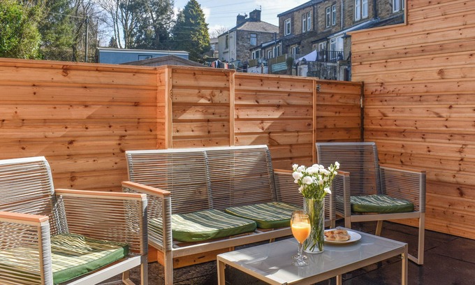 Burnley Cottage | Brun terrace offers a perfect blend of elegance and comfort.