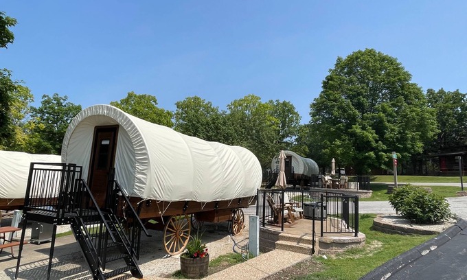Branson Cottage | California Trail Wagon includes 1 king bed, bathroom w/shower, heat & a/c, smart tv, wi-fi, microwa