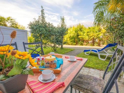 Colico Piano Apartment | Carlo B Garten Ferienwohnung EG