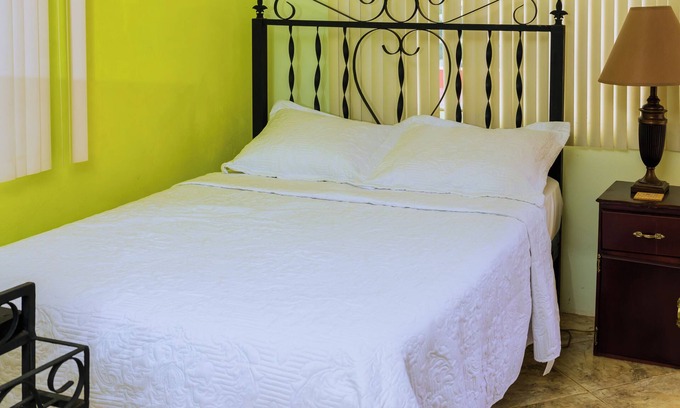 Port of Spain House | CARNIVAL ROOM