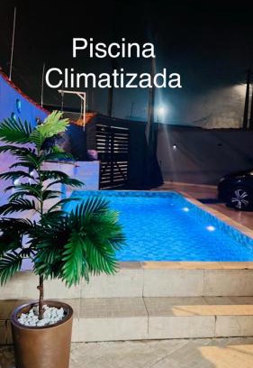 Santa Terezinha House | Casa com piscina climatizada em Itanhaém!