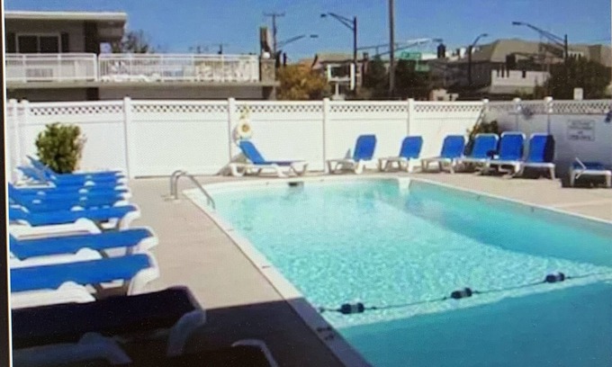 North End Apartment | Central Location - Short walk to Beach/Boardwalk w/parking and heated pool!