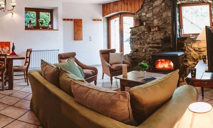 Vaujany Ski Chalet | Chalet Dibona, cosy log fire evenings 200m from the slopes, by Ski Peak