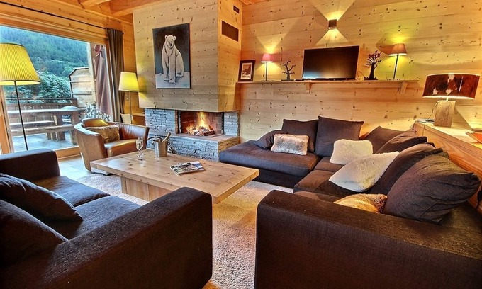 Le Serre Barbin Ski Chalet | Chalet Prestige full sun fireplace garden terrace view serrechevalierholidays