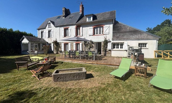 Bacilly Cottage | Charming house near Mont-Saint-Michel with enclosed garden and living room with fireplace