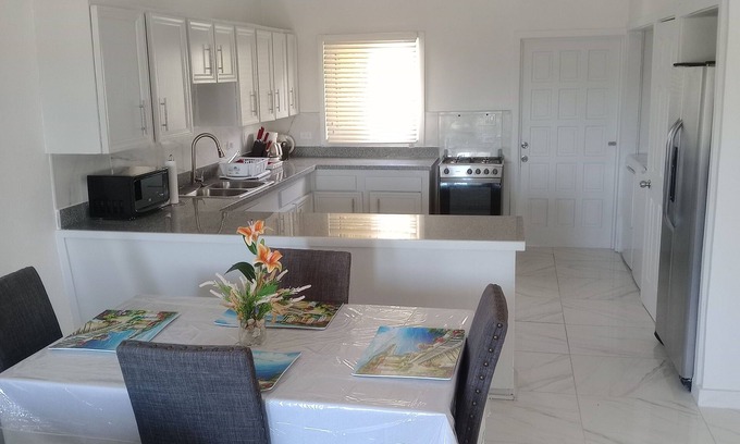 Rock Sound Apartment | Charming unit 1 & 2- 2 bedroom apartment in cool Rock Sound with AC