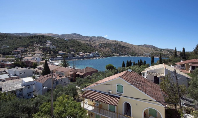 Kassiopi Apartment | Close to the beach, spacious one-bedroom apartment with sea views.