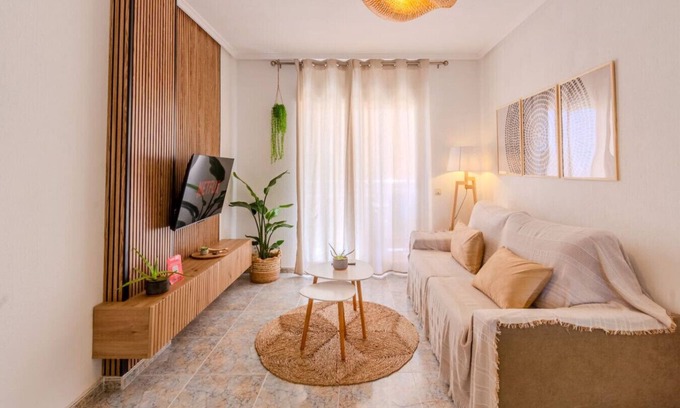 Els Arenals del Sol Apartment | Coastal Comfort with Pool & Parking