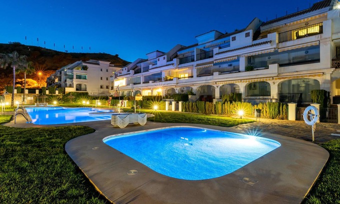 Rincon de la Victoria Apartment | Comfortable, attractively located apartment with shared pool and panoramic sea views.