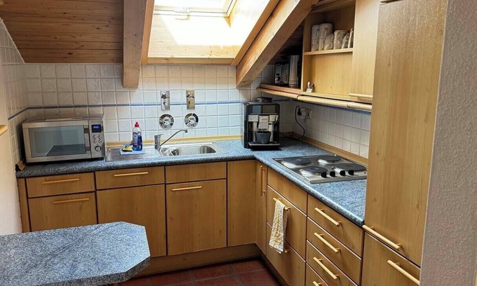 Mitterbach Condo | Comfortable furnishings, large bedroom & living room.