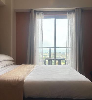 North Reclamation Area Apartment | Condo with Balcony - MIGAs Haven at Sunvida Tower