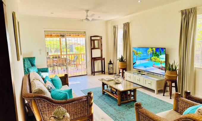 Atlantic Shores Cottage | Cotton Bay Cottage @ Freights. Large sea facing garden. Family & Pet friendly