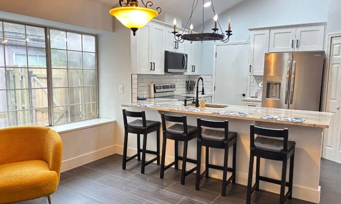 Arlington House | Cozy 2BR Getaway with Patio & Garage Near Shops, Dining & Highways!
