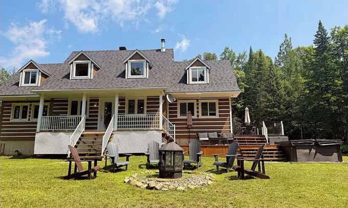 Amherst Ski Chalet | Cozy Fall Waterfront Chalet w/Spa and Beach Volleyball. Near Mont-Tremblant
