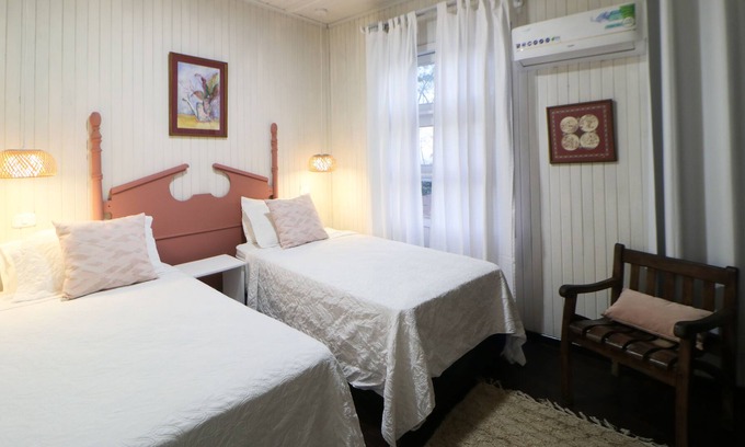 La Cruz House | Cozy hotel-style suite with private bathroom, on-site dining, & fast WiFi