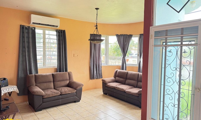 Stella House | Cozy Rincon retreat with classic amenities, steps from beach and dining.