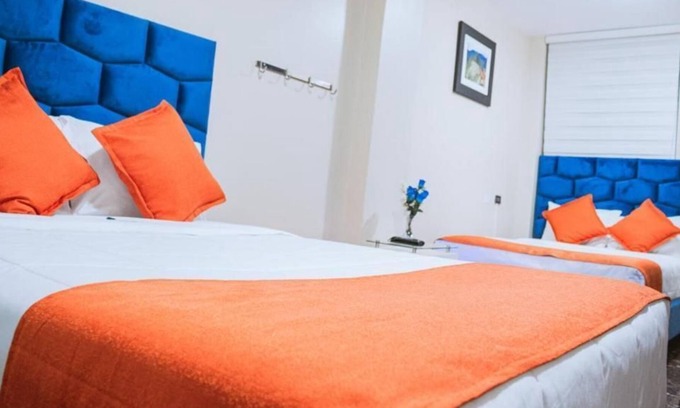 Santiago de Surco Apartment | Deluxe Queen Room with Two Queen Beds 4