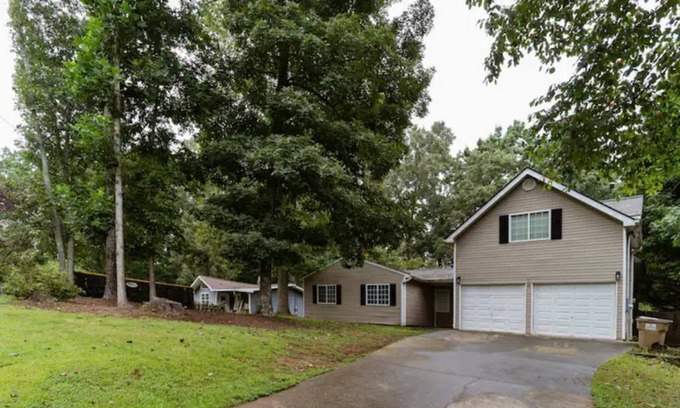 Cumming House | Desired premium location, minutes to everything!